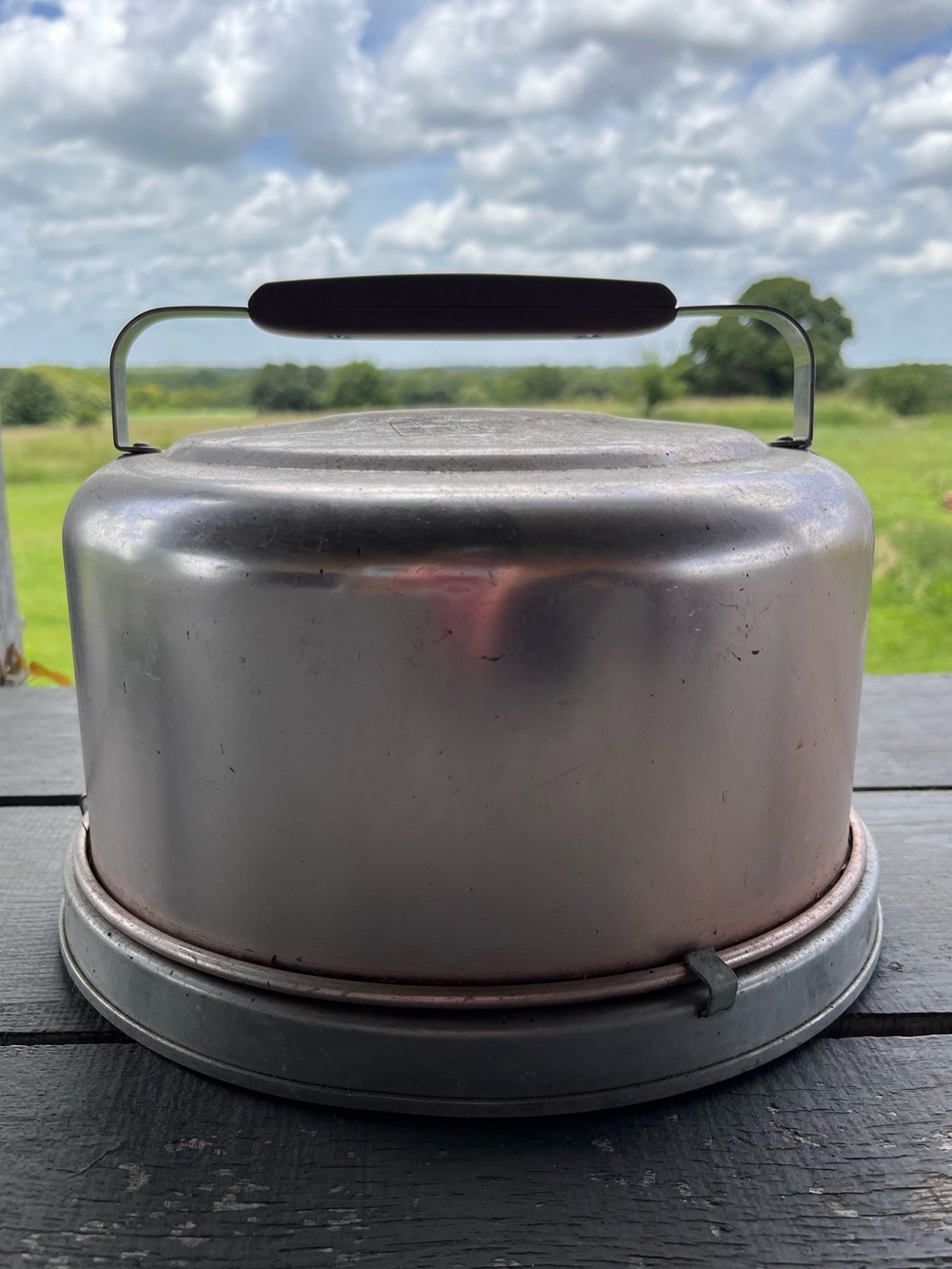 Vintage Aluminum Cake cover and carrier with subtle copper tone finish.